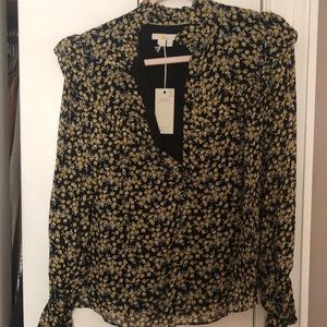Beautiful floral print blouse. Tags still on.